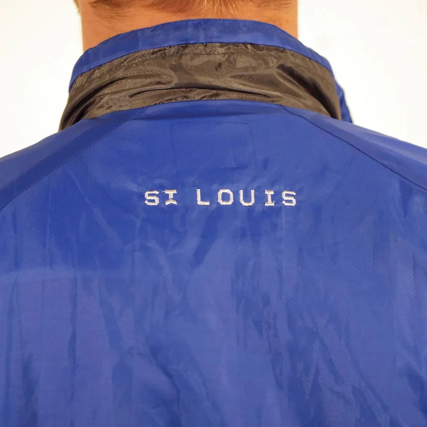 Official League St. Louis Battlehawks Full Zip Windbreaker Jacket On Model In Blue - Back View