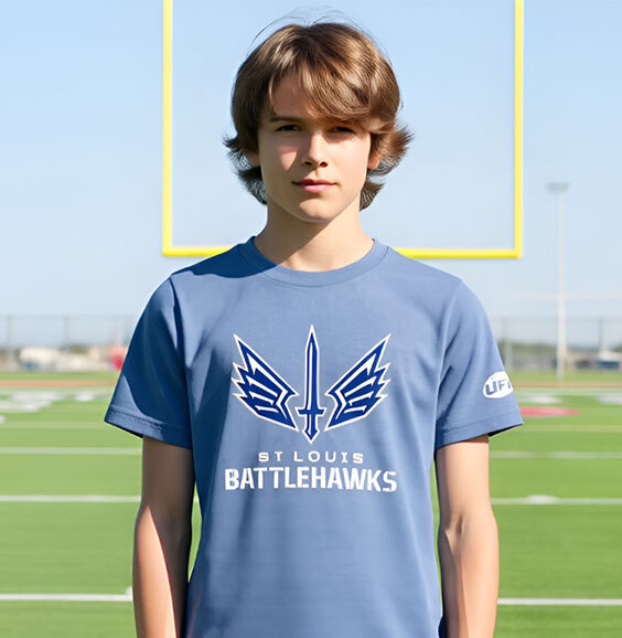 Child smiling while wearing St. Louis Battlehawks gear